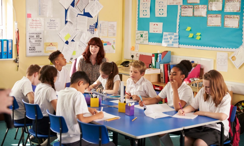 Secondary school teens in a classroom.