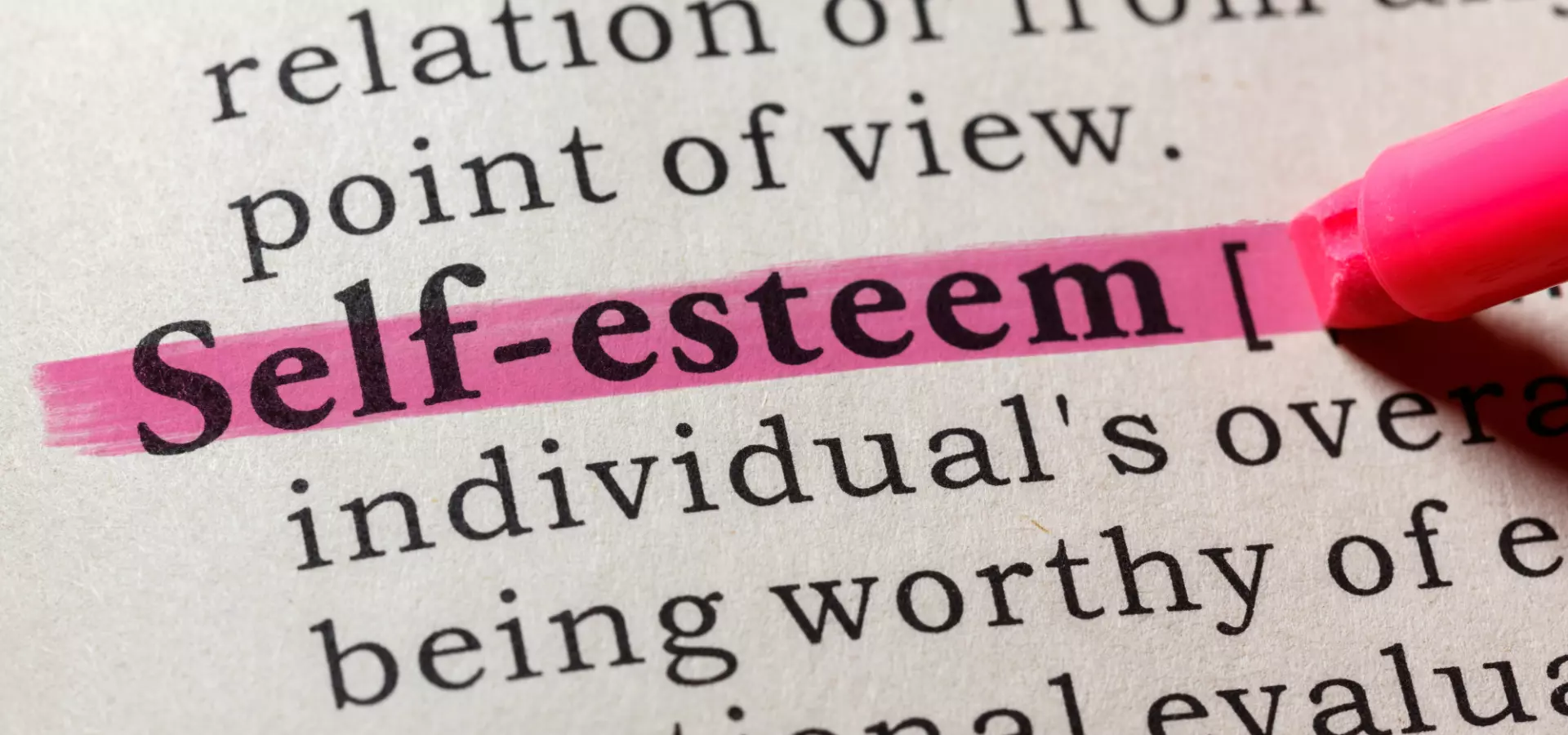 Dictionary entry with the words 'self-esteem' highlighted in pink.