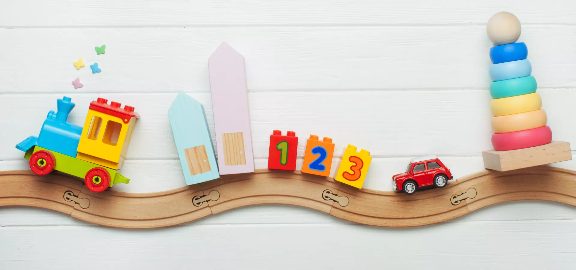 Wooden train toy with other wooden toys.