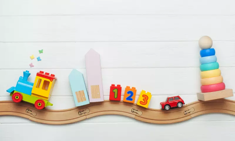 Wooden train toy with other wooden toys.