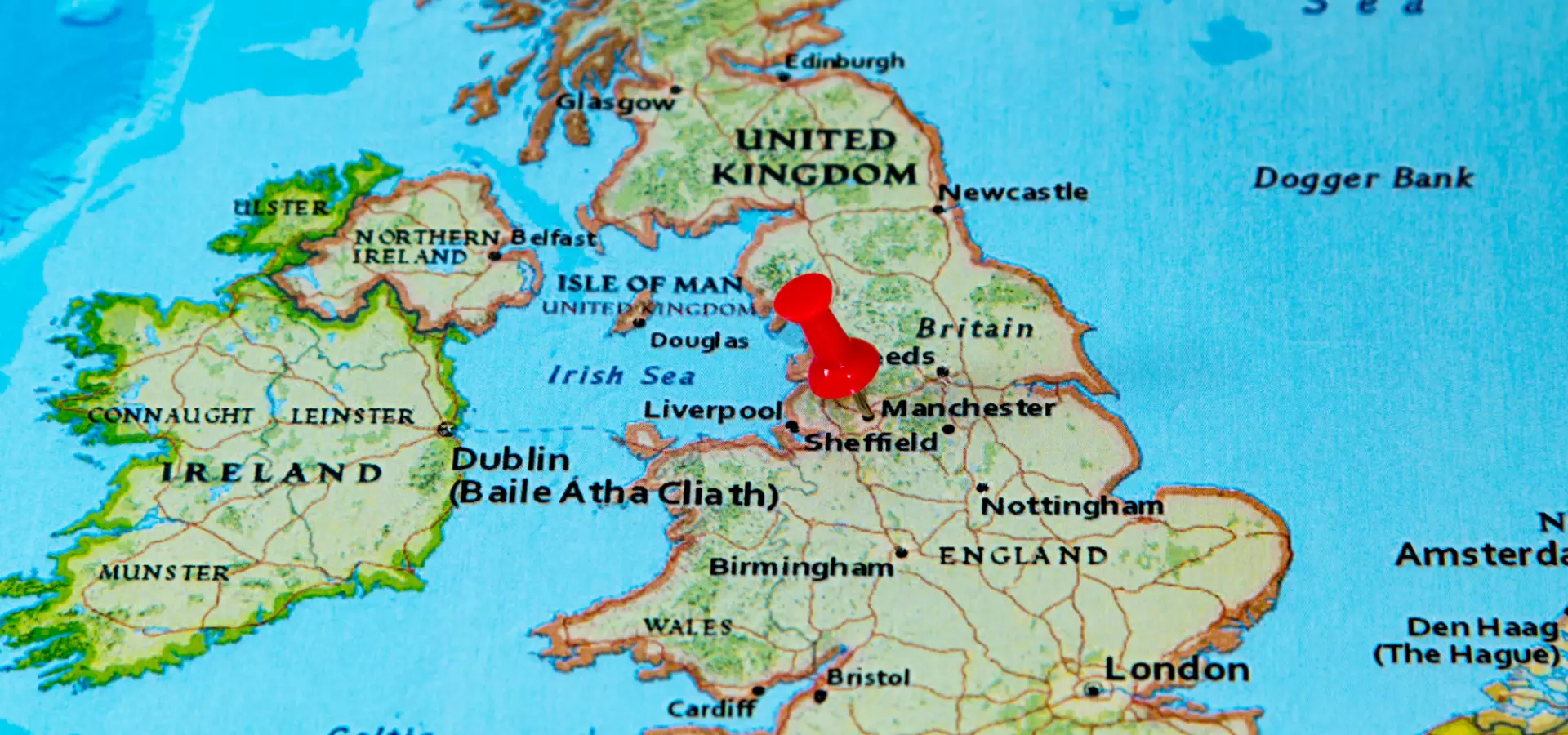 Map of the UK with a pin on Manchester.