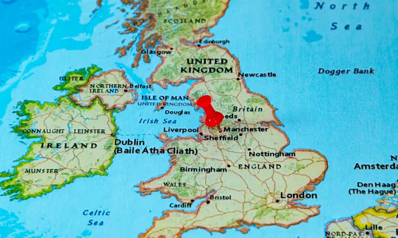 Map of the UK with a pin on Manchester.