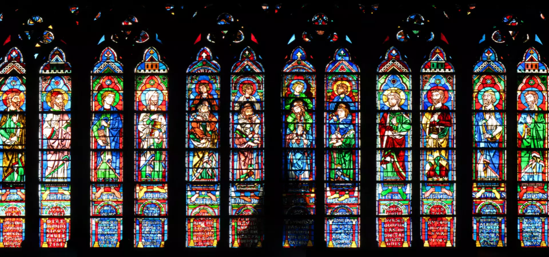 Colourful stained glass windows in a church.