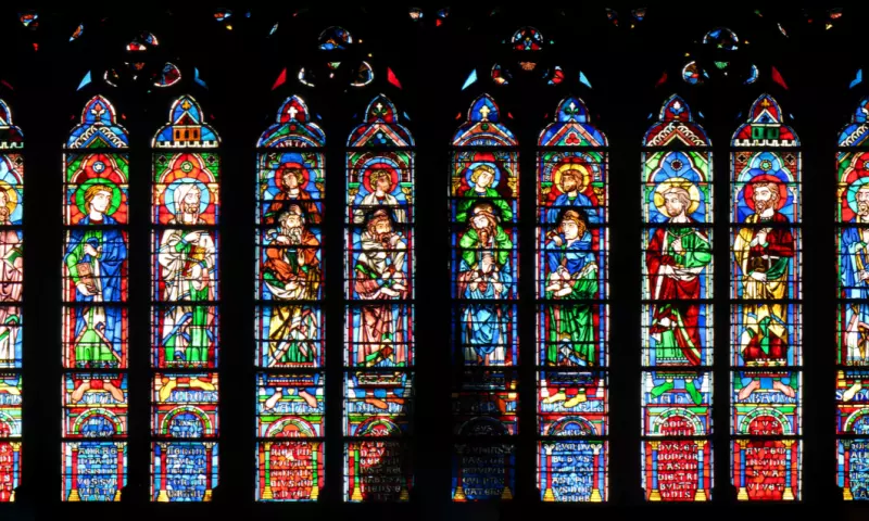 Colourful stained glass windows in a church.