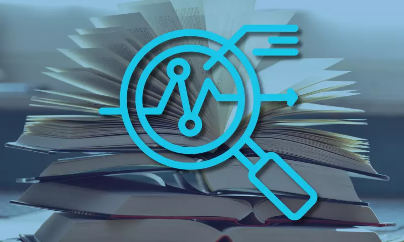 A pile of books, with on open at the top, and a magnifying glass icon to signify 'overview'.