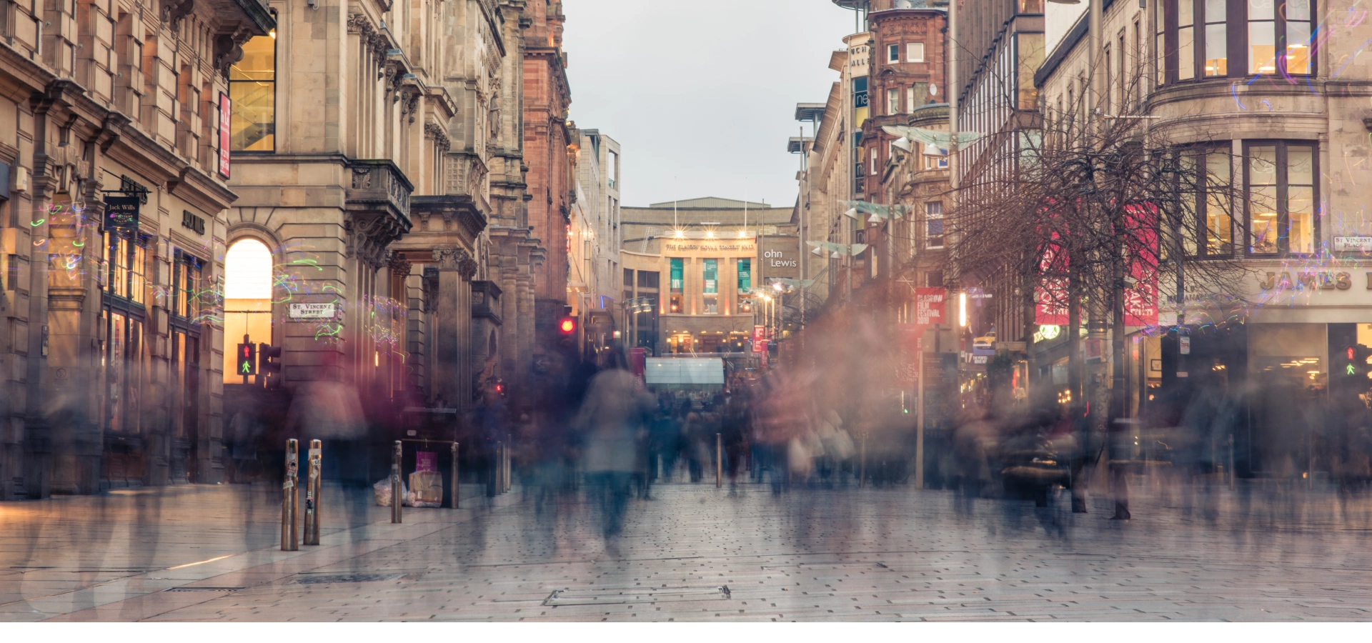 Blurry crowd walking in Buchanan street in Glasgow.